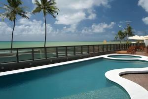 Πισίνα στο ή κοντά στο Hotel Ritz Suítes | Flat632 | Quarto com Vista mar