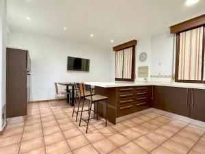 TV a/nebo společenská místnost v ubytování Santuchu Apartamento Elegante con wifi + 5 fotografií