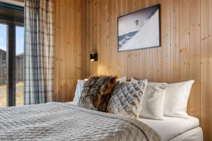Postel nebo postele na pokoji v ubytování Luxury Skilodge ski in & out