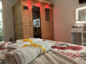 Postel nebo postele na pokoji v ubytování La Rosa di Antonio -Relax Room