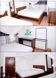 Postel nebo postele na pokoji v ubytování Lay By River Dambulla