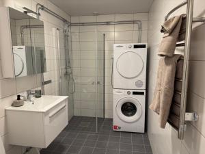 Ένα μπάνιο στο Kungsbacken Apartments AB - Bondegatan 32