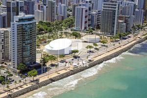 an aerial view of a city next to the ocean at Quarto Individual e Privativo - Apt moderno compartilhado com o Hoster - Boa Viagem in Recife