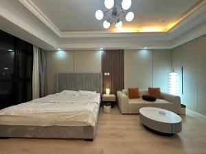 Ένα ή περισσότερα κρεβάτια σε δωμάτιο στο Qingsu Shanghai Main Branch