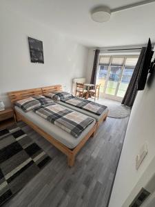 Ένα ή περισσότερα κρεβάτια σε δωμάτιο στο Apartment Toplitzsee