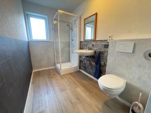 Koupelna v ubytování 33 - 42-B Gezellige vakantiewoning voor 2 personen + 4 fotografie