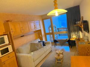 Kuchyň nebo kuchyňský kout v ubytování Logement lumineux - Centre station - Cozy + 25 fotografií