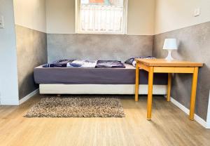 Ένα ή περισσότερα κρεβάτια σε δωμάτιο στο 33-43 - Studio voor 2 personen +4 φωτογραφίες