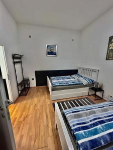 Ένα ή περισσότερα κρεβάτια σε δωμάτιο στο Vienna-Guestroom +9 φωτογραφίες
