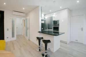 Η κουζίνα ή μικρή κουζίνα στο Apartamento do Sol, Lobão