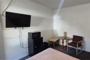 TV a/nebo společenská místnost v ubytování Hotel O Sycamore - Havana IL + 21 fotografií