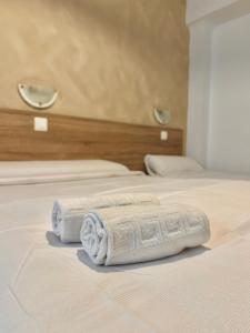 Ένα ή περισσότερα κρεβάτια σε δωμάτιο στο HS Altet Suites - Alicante Airport