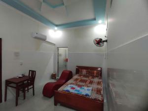 Postel nebo postele na pokoji v ubytování Nhà nghỉ Đông Phương