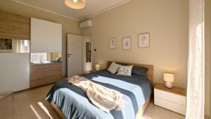 Ένα ή περισσότερα κρεβάτια σε δωμάτιο στο Ari'stay - Panoramic in Piazza Alfieri - 2BR - AC