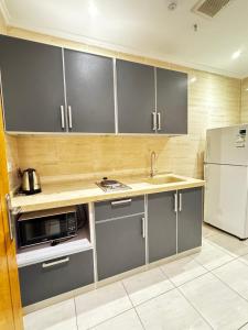 Η κουζίνα ή μικρή κουζίνα στο Luxury suite