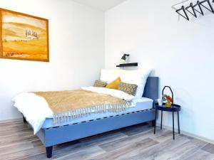 Postel nebo postele na pokoji v ubytování 2-SZ-Dachgeschoss-Apt - 4 getrennte Schlafplätze - Nähe HBF & Messe DUS