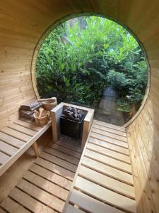 an inside view of a room with a circular window at Villa Aurora in Orbey +24 photos