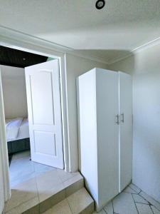 Postel nebo postele na pokoji v ubytování Evernice Guest House + 2 fotografie