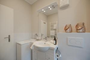 Koupelna v ubytování Thyra + 29 fotografií