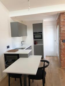 Kuchyň nebo kuchyňský kout v ubytování Le nid - Centre ville - Capitole- Climatisé
