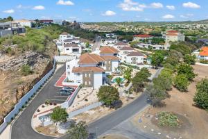 an aerial view of a residential neighborhood with houses at Coral Whisper - Aquamarine 8 in Willemstad +33 photos