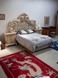 En eller flere senge i et værelse på Eclectic Old-Fashioned Comfort