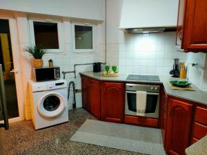 Kuchyň nebo kuchyňský kout v ubytování Lovely apartment in city center + 27 fotografií