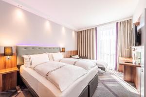 Postel nebo postele na pokoji v ubytování Premier Inn Düsseldorf City Centre