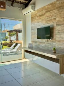 Μια τηλεόραση ή/και κέντρο ψυχαγωγίας στο Rancho Palmeira Jardim