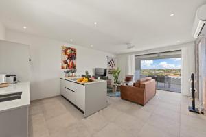 Kuchyň nebo kuchyňský kout v ubytování Caribbean Lounge - Aquamarine 4