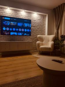 Χώρος καθιστικού στο Otopeni Airport Apartment - King Bed - Free Shuttle Included