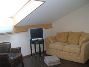 Posezení v ubytování Logis Hôtel Restaurant de Bas