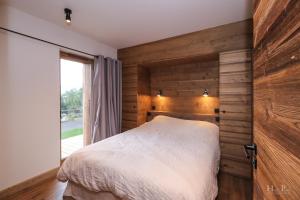 Giường trong phòng chung tại Chalet du Gouter