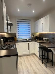 Η κουζίνα ή μικρή κουζίνα στο 60 Springfield Road