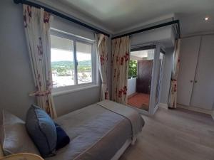 Ένα ή περισσότερα κρεβάτια σε δωμάτιο στο WATERFRONT 2 QUAY WEST