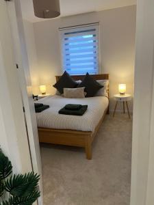 Ένα ή περισσότερα κρεβάτια σε δωμάτιο στο 60 Springfield Road