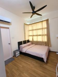 Postel nebo postele na pokoji v ubytování KF Homestay