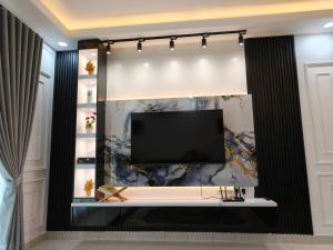 TV a/nebo společenská místnost v ubytování KF Homestay