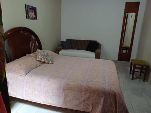 Ένα ή περισσότερα κρεβάτια σε δωμάτιο στο Casa de Lençóis +1 φωτογραφίες