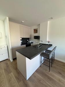 Η κουζίνα ή μικρή κουζίνα στο Roomy Estudio