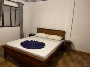 Postel nebo postele na pokoji v ubytování Coconut beach