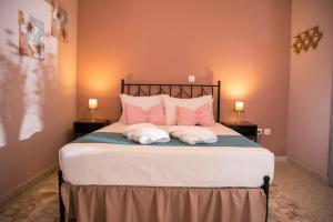 Ένα ή περισσότερα κρεβάτια σε δωμάτιο στο Lilia Apartments