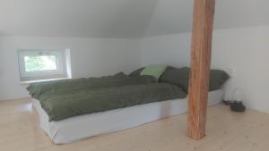 Кровать или кровати в номере Lučany nad Nisou 804