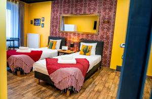 Postel nebo postele na pokoji v ubytování Kaktus Chill & Sleeping - 50 m od Rynku