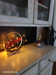 a kitchen counter with a christmas sign and lights at onde di luce in Ravello +51 photos