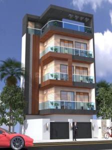 un homme debout devant un grand bâtiment dans l'établissement Singhal Residency PG - RENT, à Greater Noida