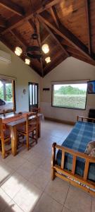 Ένα ή περισσότερα κρεβάτια σε δωμάτιο στο Cabañas Lemunko +26 φωτογραφίες