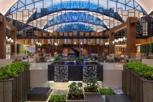a rendering of the lobby of a hotel at Hyatt Regency Dubai Creek Heights in Dubai +31 photos
