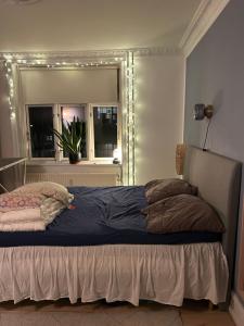 Ένα ή περισσότερα κρεβάτια σε δωμάτιο στο Apartment in heart of Amager +5 φωτογραφίες