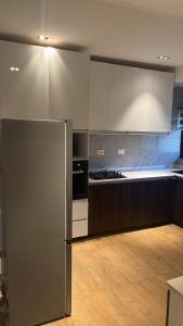 Kuchyň nebo kuchyňský kout v ubytování Macdonald Residence